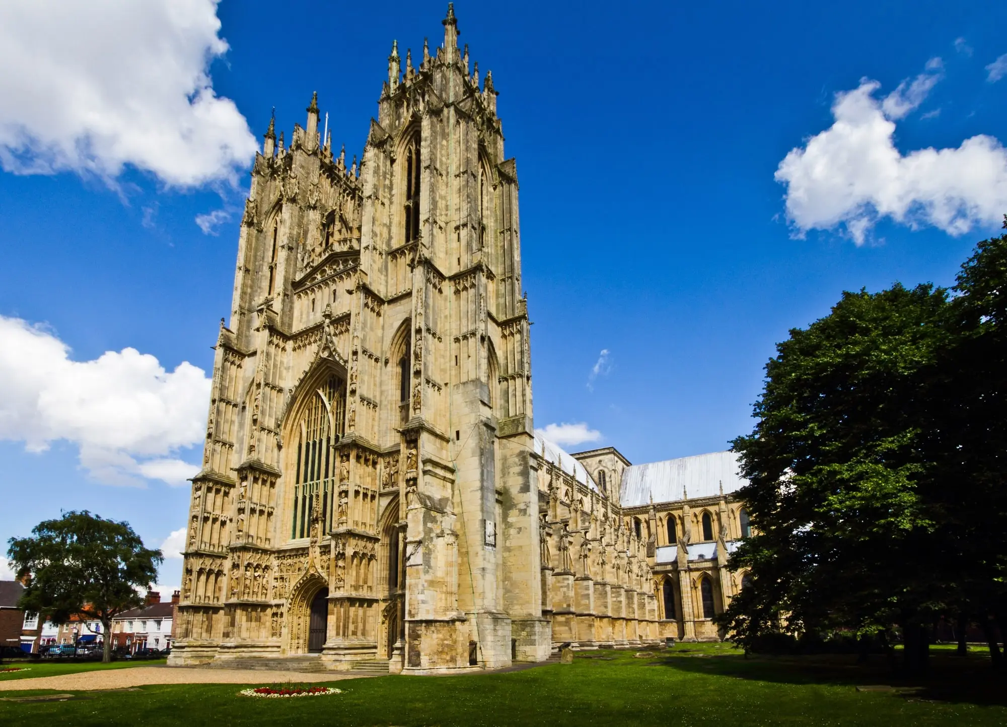 The twin towers of the west front of Beverley Minster in East Yorkshire on a bright summer day